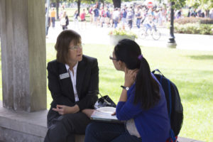 educator talking to a student