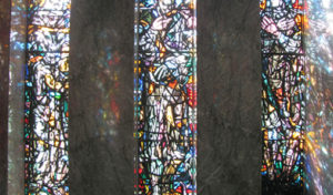 three stained glass in a church